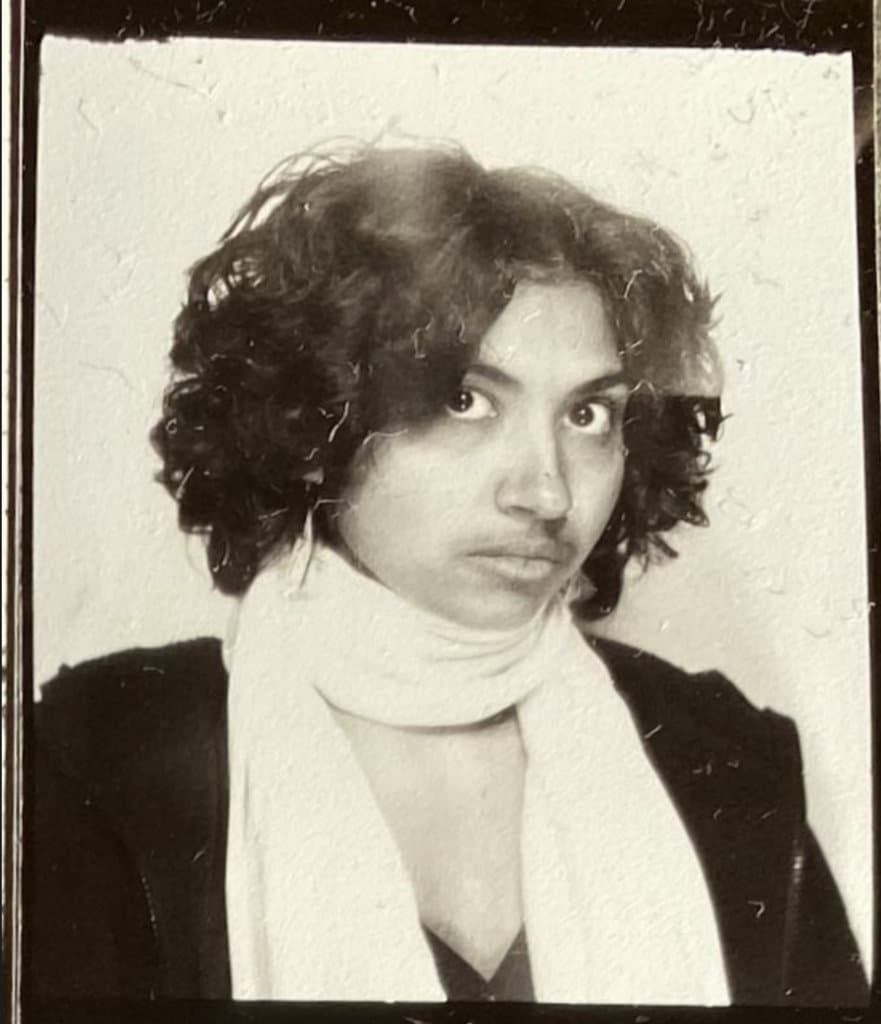 a black-and-white portrait of saba lou in a pale scarf.